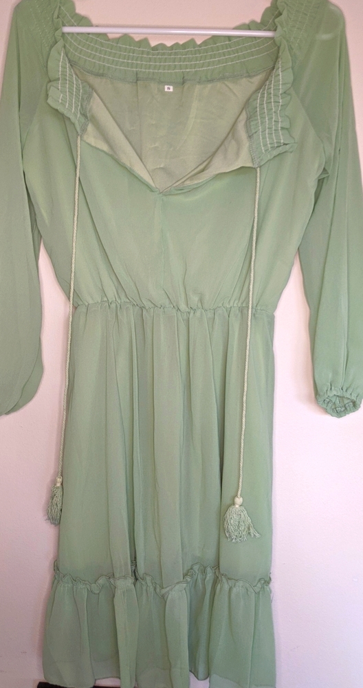 Cute mint green dress with ruffles